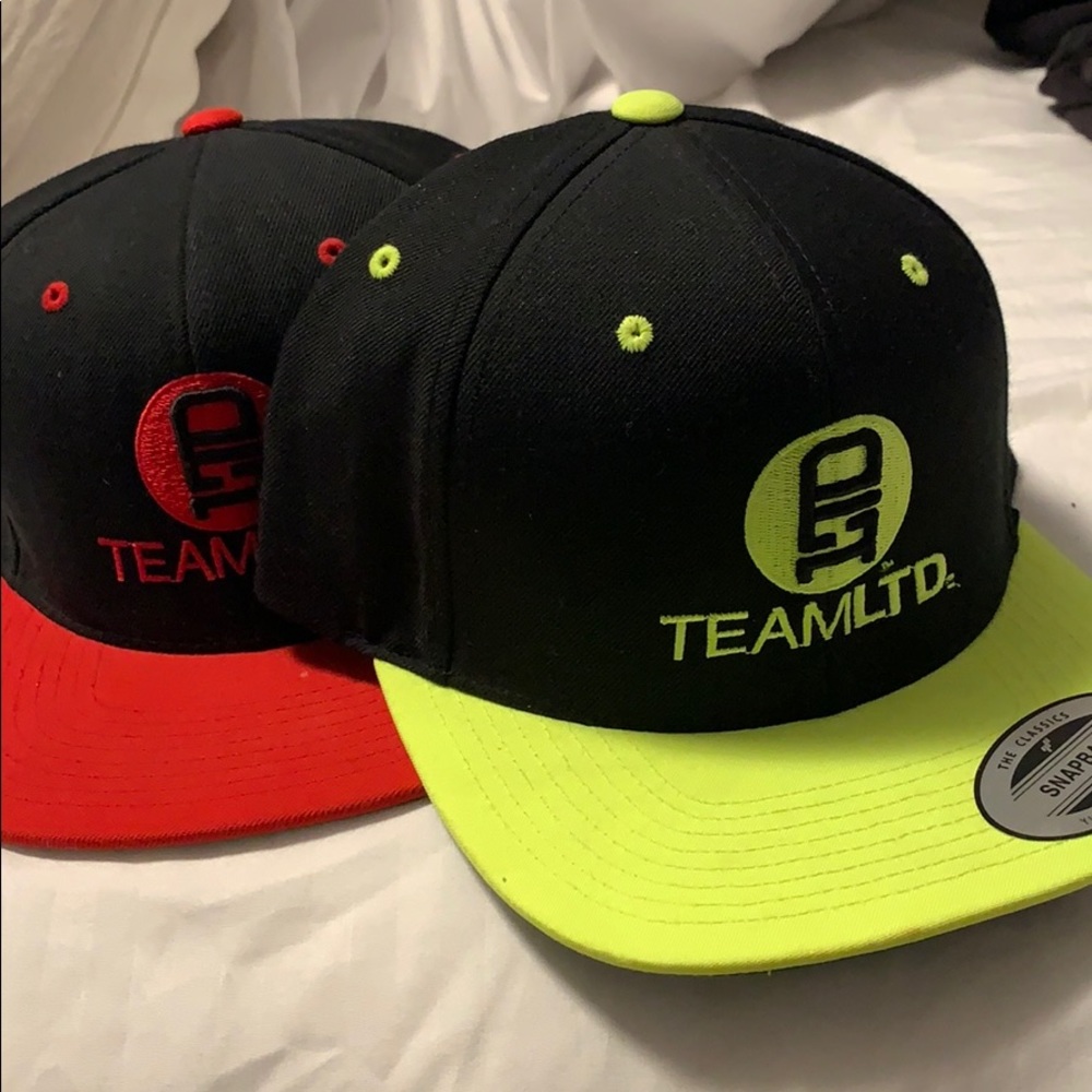Like New! Baseball caps red and yellow. Get both !